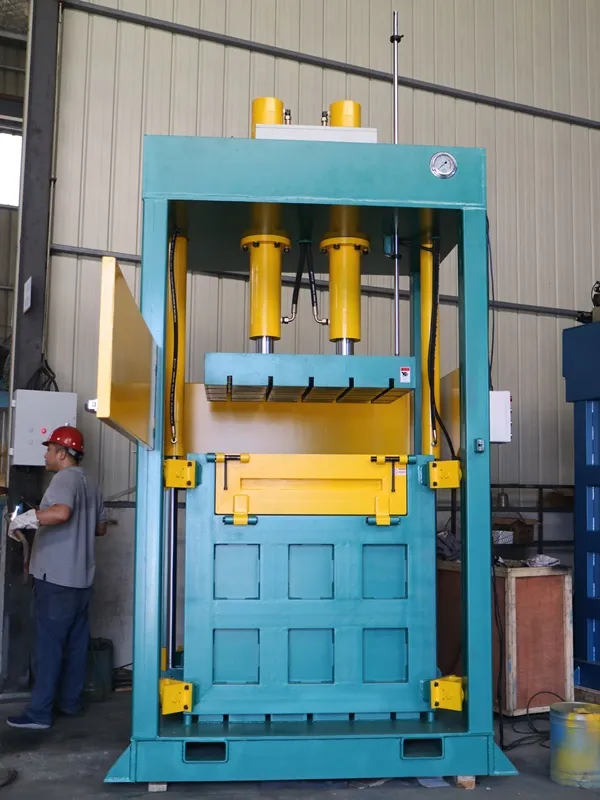 Double cylinder clothing baler